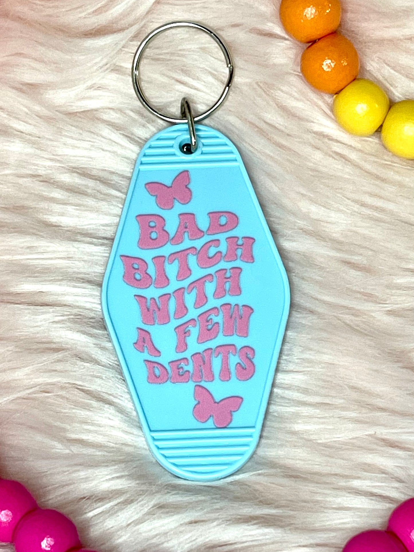 Motel Key Tag - Bad bitch with a few dents